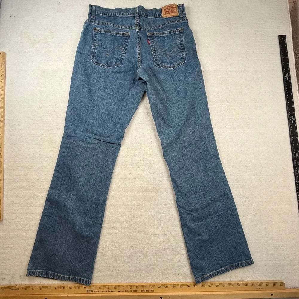 VTG 2006 Levis 550 jeans women 12 Relaxed Boot Cut Medium Wash Stretch
